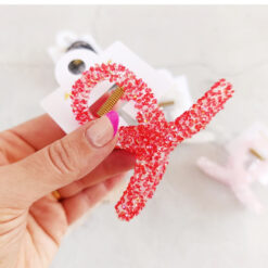Alternative view of BROCHE PLÁSTICO CON BRILLOS